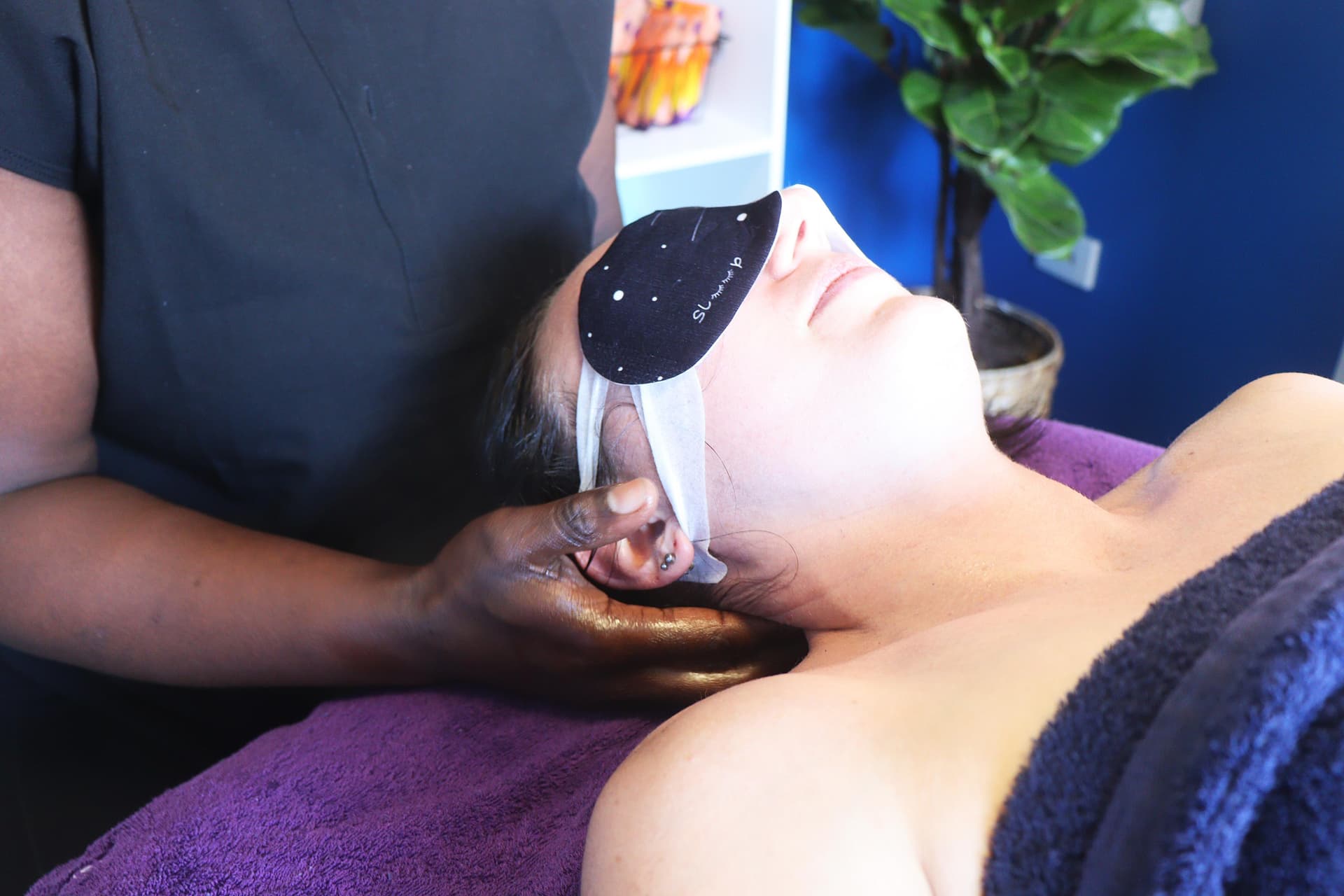 Gloria performing facial and neck massage